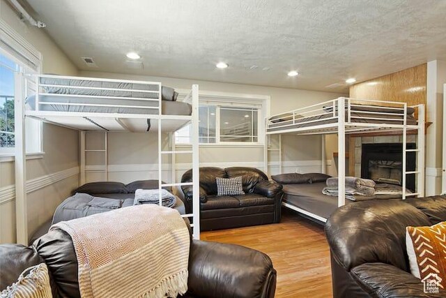 bedroom with wood-type flooring
