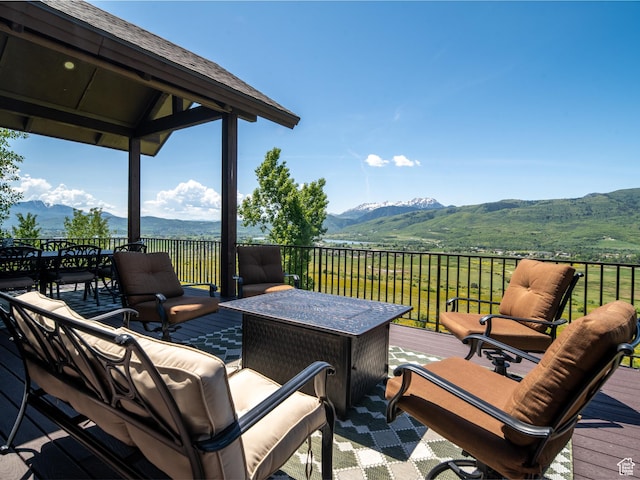 5932 E Big Horn Pkwy, Eden, UT 84310 - wooden terrace with a mountain view and outdoor lounge area