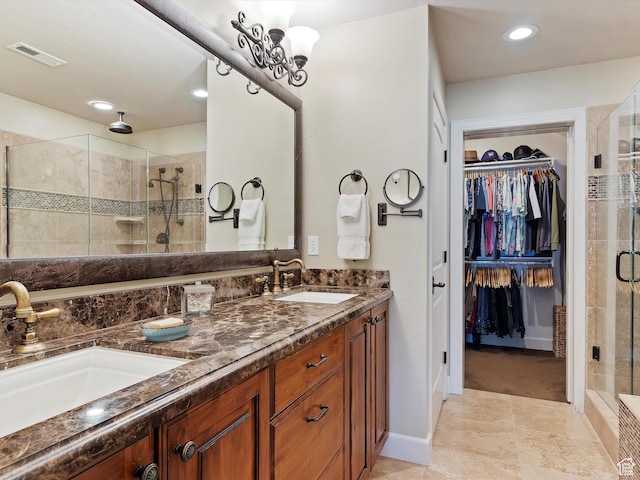 bathroom featuring vanity and walk in shower