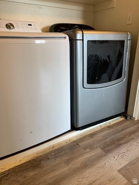 667 N 340 W, Orem, UT 84057 - clothes washing area featuring wood finished floors