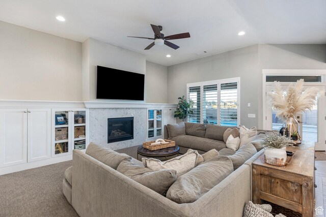 2305 E 3350 S, St George, UT 84790 - carpeted living room featuring recessed lighting, a tiled fireplace, and a ceiling fan