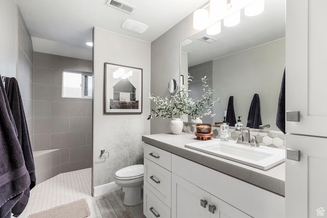 2305 E 3350 S, St George, UT 84790 - full bath featuring walk in shower, visible vents, vanity, and toilet