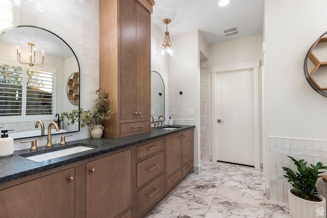 2305 E 3350 S, St George, UT 84790 - full bathroom with visible vents, a sink, marble finish floor, and double vanity