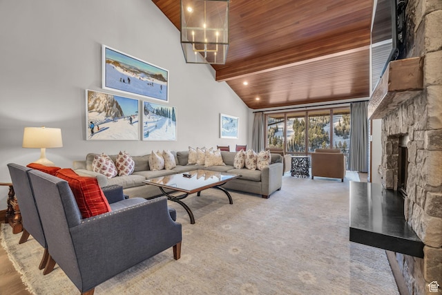 7700 Stein Way Unit 215, Park City, UT 84060 - living room with a stone fireplace, wood ceiling, high vaulted ceiling, beam ceiling, and carpet