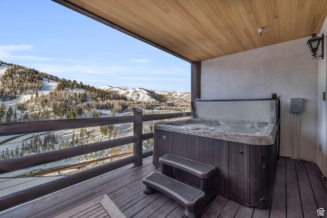 7700 Stein Way Unit 215, Park City, UT 84060 - snow covered deck with a mountain view and a hot tub