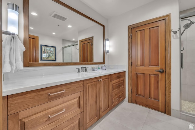 7700 Stein Way Unit 215, Park City, UT 84060 - bathroom featuring tile patterned flooring, vanity, and a shower with shower door