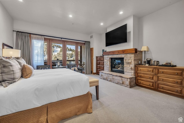 7700 Stein Way Unit 215, Park City, UT 84060 - carpeted bedroom with vaulted ceiling, access to exterior, and a fireplace