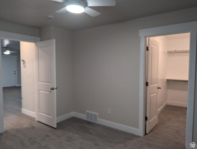 350 W Dublin S, Eureka, UT 84628 - unfurnished bedroom featuring a spacious closet, visible vents, baseboards, and a ceiling fan