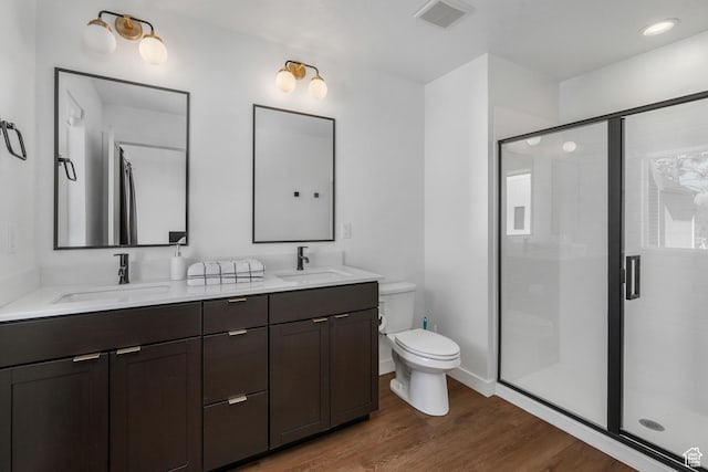 474 E Alice Way, Layton, UT 84041 - bathroom featuring vanity, hardwood / wood-style floors, a shower with shower door, and toilet