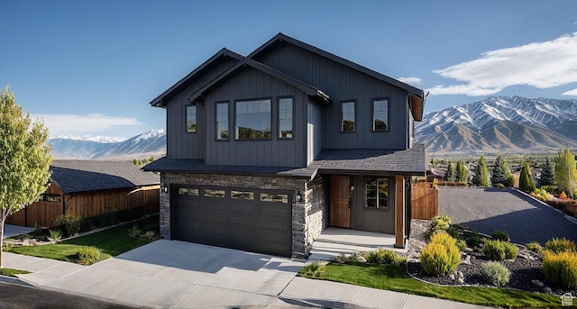 1279 Mahogany Way Unit 72, Park City, UT 84098 - view of front of property with stone siding, a mountain view, driveway, and an attached garage