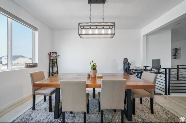 598 S Otto Ln, Grantsville, UT 84029 - dining space featuring wood finished floors and baseboards