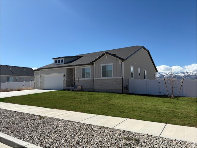 598 S Otto Ln, Grantsville, UT 84029 - ranch-style home with a garage, board and batten siding, fence, concrete driveway, and a gate