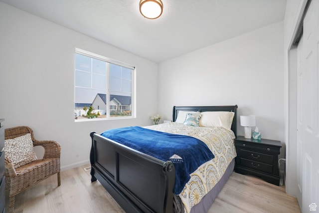 598 S Otto Ln, Grantsville, UT 84029 - bedroom with light wood-style floors and baseboards