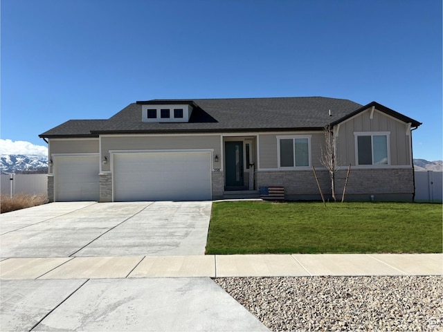 598 S Otto Ln, Grantsville, UT 84029 - ranch-style home with an attached garage, board and batten siding, fence, a front lawn, and driveway