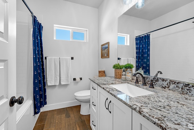 3727 S Larkspur Cir, Saratoga Springs, UT 84045 - bathroom featuring wood finished floors, a healthy amount of sunlight, toilet, and vanity