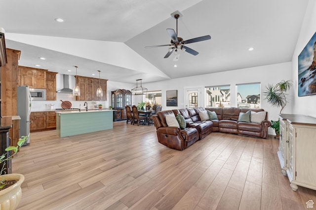 3727 S Larkspur Cir, Saratoga Springs, UT 84045 - living area featuring high vaulted ceiling, light wood-style floors, ceiling fan, and recessed lighting
