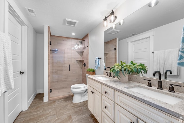 3727 S Larkspur Cir, Saratoga Springs, UT 84045 - bathroom with a stall shower, visible vents, and a sink