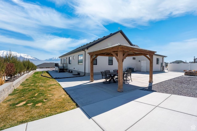 3727 S Larkspur Cir, Saratoga Springs, UT 84045 - view of patio with a mountain view, a gazebo, and fence