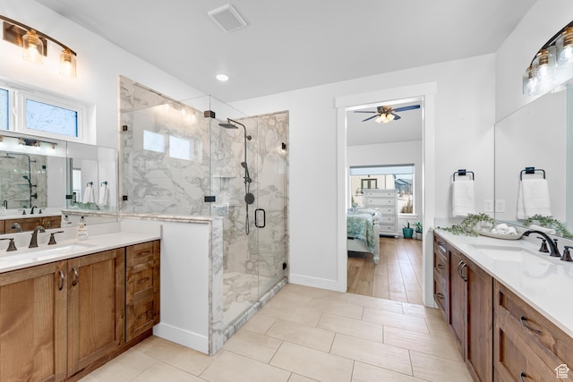 3727 S Larkspur Cir, Saratoga Springs, UT 84045 - ensuite bathroom with a marble finish shower, ceiling fan, a sink, and connected bathroom