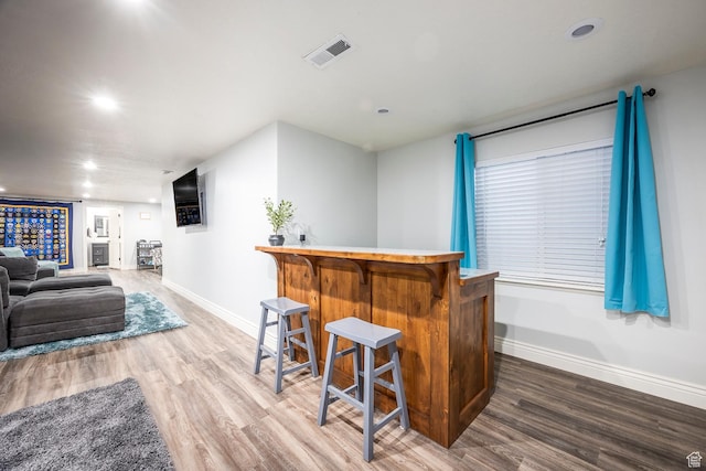 518 N 1980 E, Spanish Fork, UT 84660 - bar featuring wood finished floors, baseboards, a dry bar, and visible vents