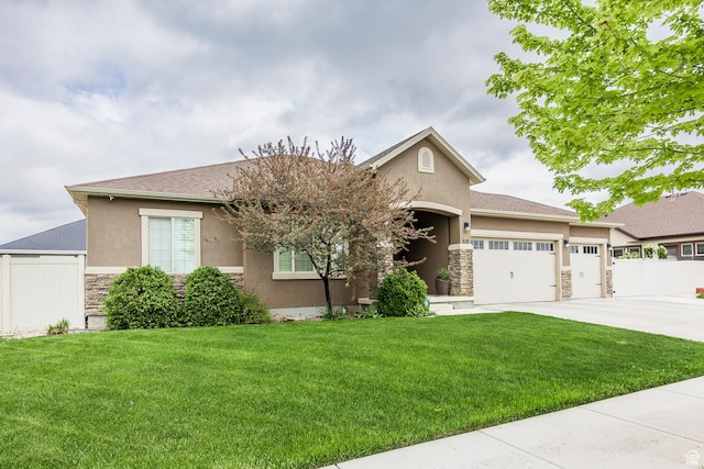 518 N 1980 E, Spanish Fork, UT 84660 - single story home featuring stone siding, stucco siding, a garage, and concrete driveway
