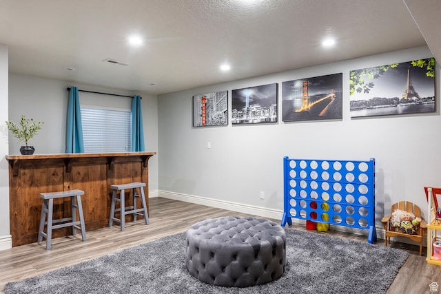 518 N 1980 E, Spanish Fork, UT 84660 - playroom with wood finished floors, visible vents, baseboards, a dry bar, and recessed lighting