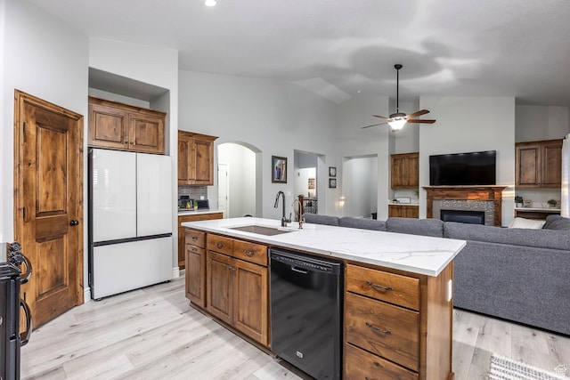 518 N 1980 E, Spanish Fork, UT 84660 - kitchen featuring white fridge, a ceiling fan, a sink, black dishwasher, and light wood-style floors
