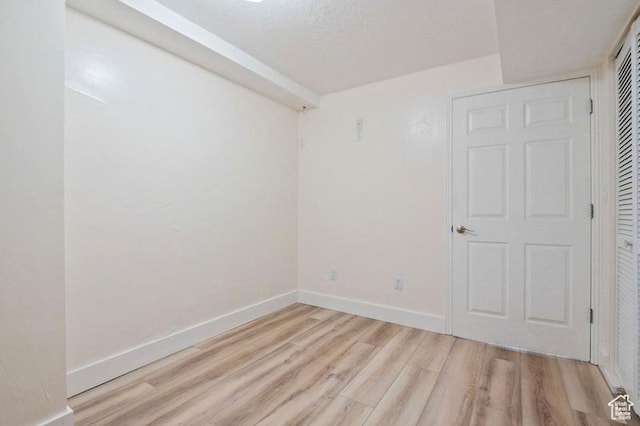 empty room featuring light hardwood / wood-style floors