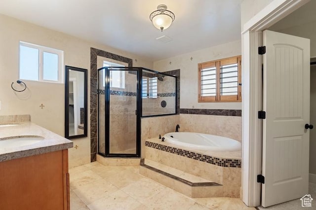 bathroom featuring vanity and plus walk in shower