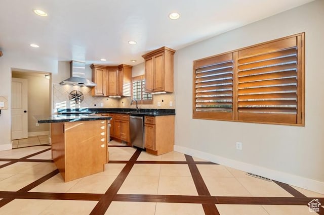 kitchen with tasteful backsplash, dishwasher, a kitchen breakfast bar, a center island, and wall chimney range hood