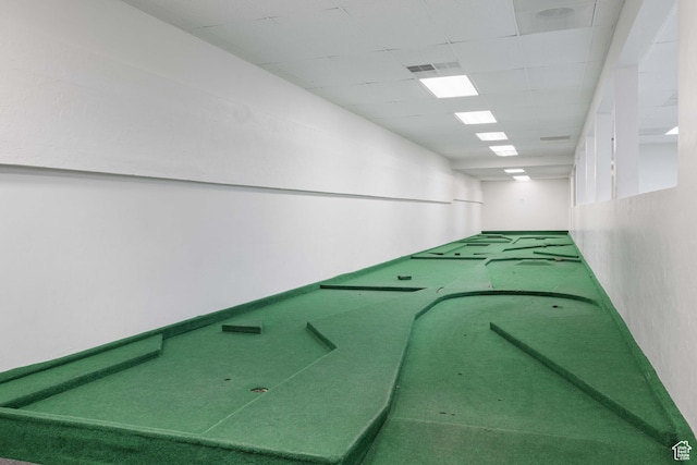 interior space featuring a drop ceiling