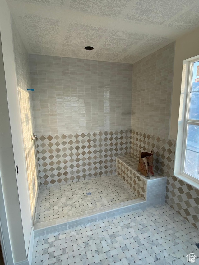 1299 S 1090 E, Salem, UT 84653 - full bath featuring a tile shower, plenty of natural light, and a textured ceiling