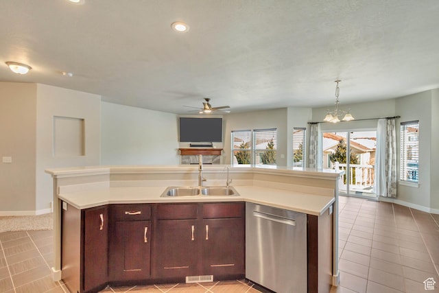 kitchen with stainless steel dishwasher, a ceiling fan, a sink, and baseboards