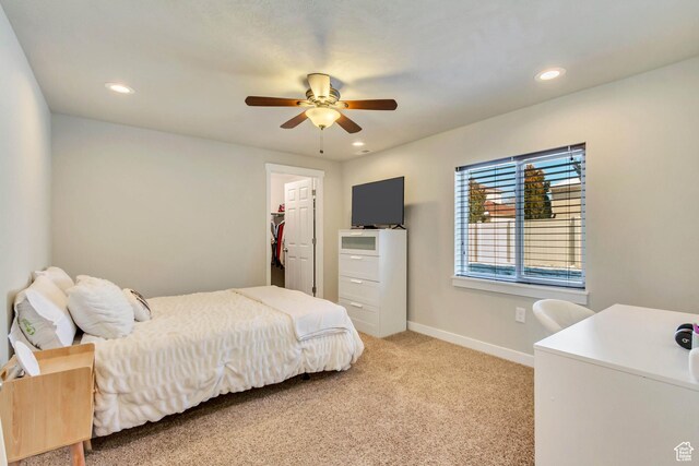 bedroom featuring recessed lighting, a ceiling fan, light colored carpet, and baseboards