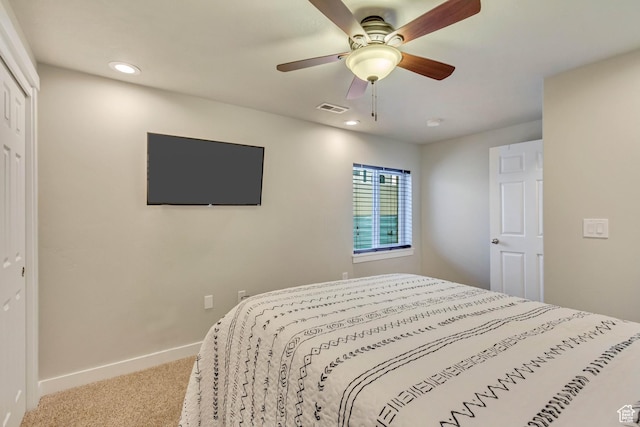 carpeted bedroom featuring baseboards, visible vents, a ceiling fan, and recessed lighting