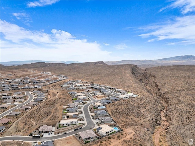 drone / aerial view featuring a mountain view