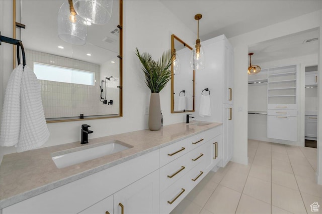 bathroom with vanity and tile patterned floors