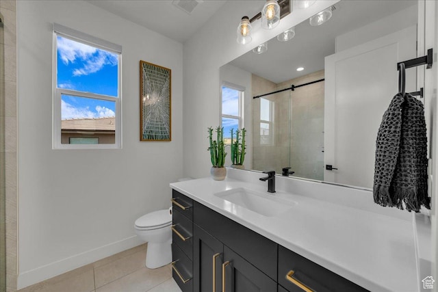 bathroom featuring walk in shower, vanity, toilet, and tile patterned flooring