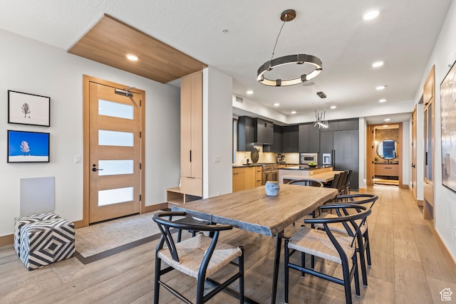 1271 Lowell Ave Unit B202, Park City, UT 84060 - dining area featuring light wood-type flooring