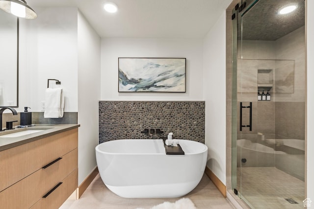 1271 Lowell Ave Unit B202, Park City, UT 84060 - bathroom featuring plus walk in shower, tile walls, and vanity