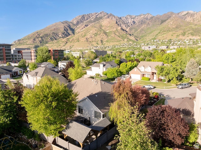 6658 S Caracol Cv, Cottonwood Heights, UT 84121 - aerial view of residential area featuring a mountain backdrop