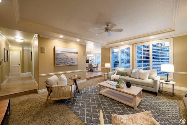 6658 S Caracol Cv, Cottonwood Heights, UT 84121 - carpeted living room with a tray ceiling, crown molding, baseboards, a ceiling fan, and recessed lighting