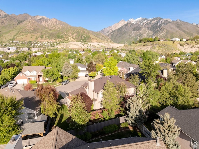 6658 S Caracol Cv, Cottonwood Heights, UT 84121 - aerial view of residential area featuring a mountain backdrop