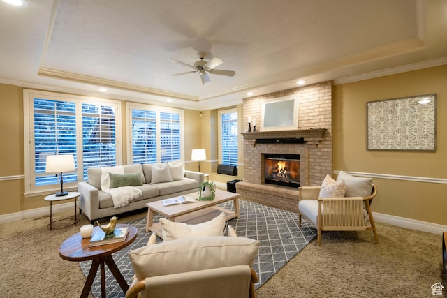 6658 S Caracol Cv, Cottonwood Heights, UT 84121 - living area featuring a raised ceiling, a ceiling fan, ornamental molding, a fireplace, and recessed lighting