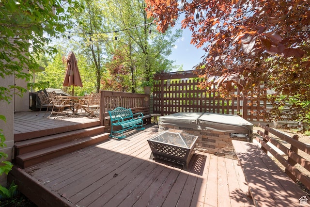 6658 S Caracol Cv, Cottonwood Heights, UT 84121 - deck with an outdoor fire pit and outdoor dining space