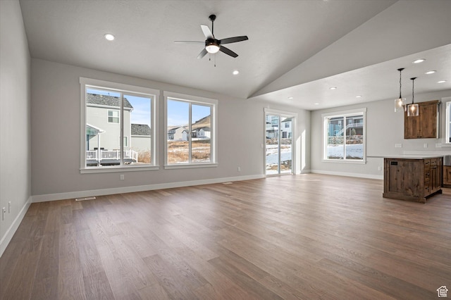 855 E 410 N Unit 157, Hyde Park, UT 84318 - unfurnished living room with lofted ceiling, wood-type flooring, and ceiling fan