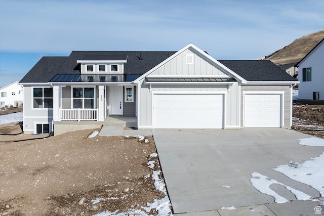 855 E 410 N Unit 157, Hyde Park, UT 84318 - view of front facade with a garage and a porch