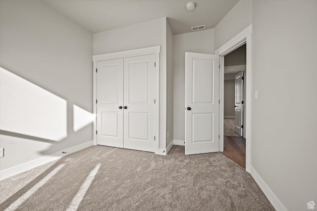 855 E 410 N Unit 157, Hyde Park, UT 84318 - unfurnished bedroom featuring light colored carpet and a closet