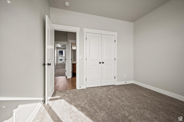 855 E 410 N Unit 157, Hyde Park, UT 84318 - unfurnished bedroom with dark colored carpet and a closet