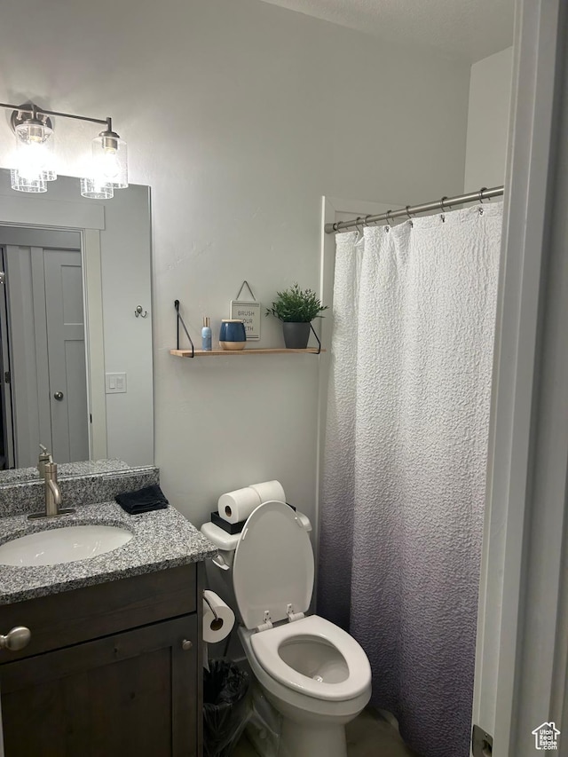133 E Sailors Way, Garden City, UT 84028 - bathroom with toilet, curtained shower, and vanity
